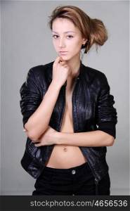 beautiful girl in a leather jacket