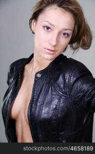 beautiful girl in a leather jacket