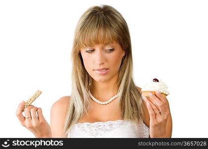 beautiful girl in hesitation to choose between sweet or diet food