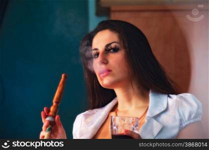 beautiful girl in smoke with hookah