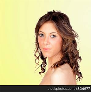 Beautiful girl isolated on a over yellow background