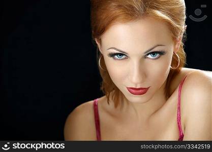 Beautiful girl on a black background, isolated