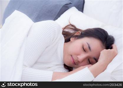 Beautiful girl on bed sleeping at home in the bedroom.