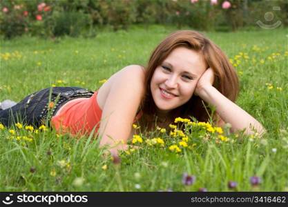 beautiful girl on the green grass