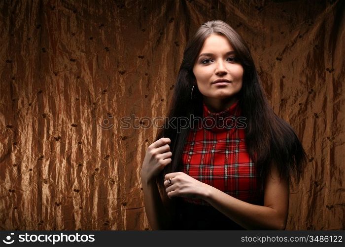 beautiful girl portrait against a wall