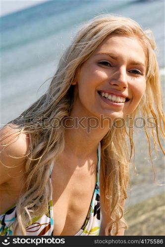Beautiful girl relaxing on the beach