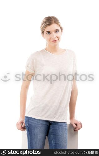 Beautiful girl standing over a white background