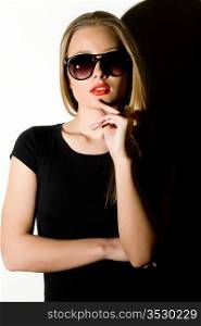 beautiful girl to wearing spectacles and black clothes