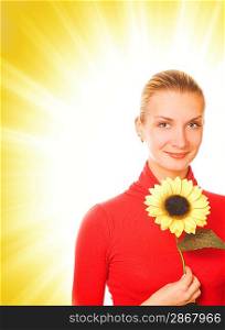 Beautiful girl with a sunflower on abstract background