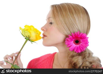 beautiful girl with a yellow rose. Isolated on white background