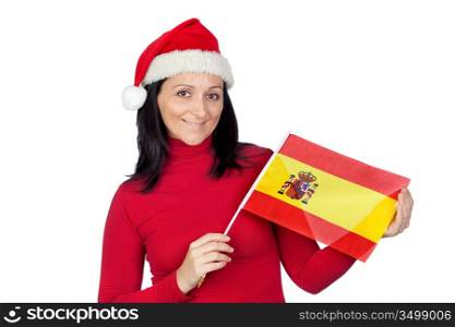Beautiful girl with Christmas hat and spanish flag on a over white background
