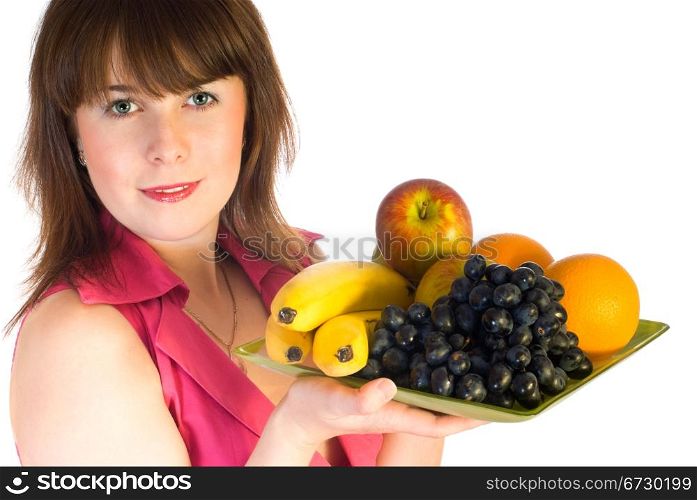 beautiful girl with dish of fruits isolated on white