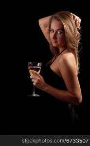 beautiful girl with glass of wine, looking into camera