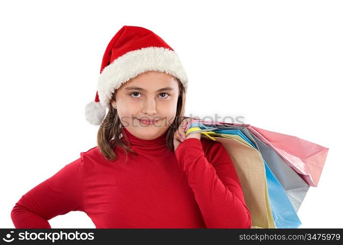 Beautiful girl with hat of christmas and bags on a over white background