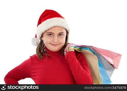 Beautiful girl with hat of christmas and bags on a over white background