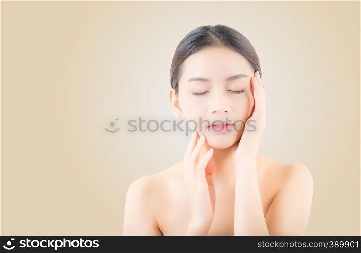 Beautiful girl with makeup, woman portrait and skin care cosmetic concept / attractive beauty asian girl on face on yellow background.