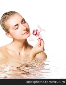 Beautiful girl with orchid flowers in rendered water