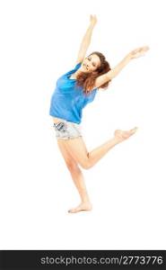 Beautiful girl with short jeans and blue shirt is dancing on white background
