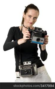 Beautiful girl with two vintage cameras, isolation on white