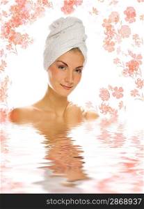 Beautiful girl with white towel on her head reflected in rendered water