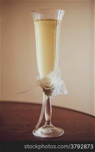 Beautiful glass of champagne in vintage style