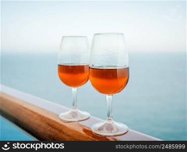Beautiful glass with a drink. Side view, close-up. Vacation and travel concept. Moments of celebration. Beautiful glass with a drink. Side view