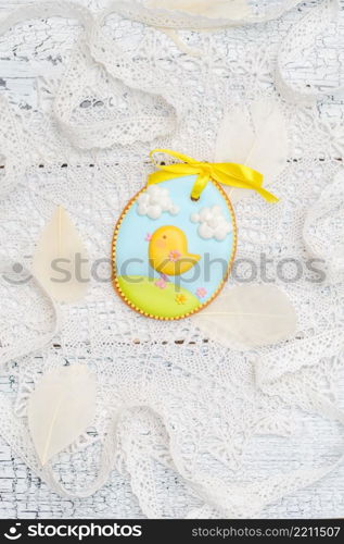 Beautiful glazed Easter cookies on wooden table. Beautiful glazed Easter cookies