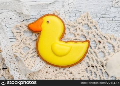 Beautiful glazed Easter cookies on wooden table. Beautiful glazed Easter cookies - duck