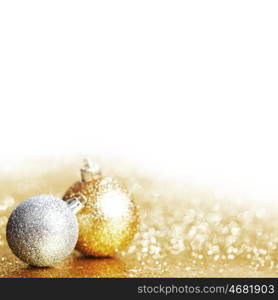 Beautiful Glitter christmas balls close-up on shining background