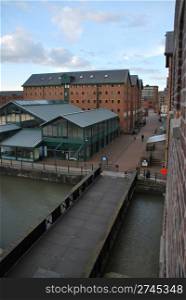 beautiful Gloucester docks with typical warehouse buildings (sunset picture)