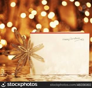 Beautiful gold happy Christmas card,winter holiday background, decoration postcard with snowflakes abstract over defocus lights
