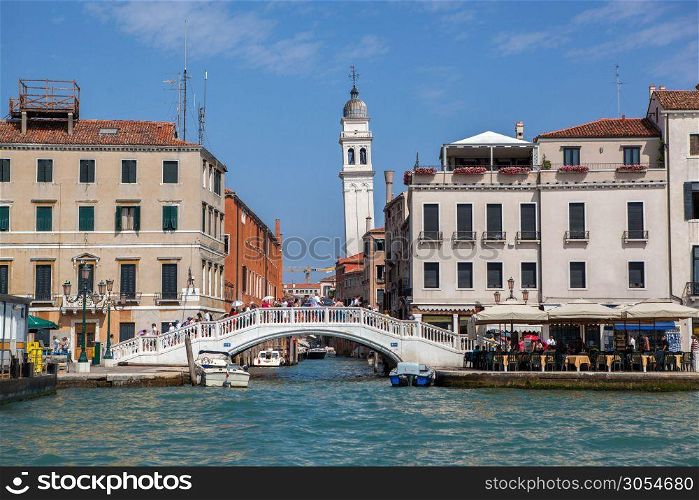 Beautiful Grand Canal in Venice. Gorgeous bridge and tower on background. Italy.. Venice canal scene in Italy