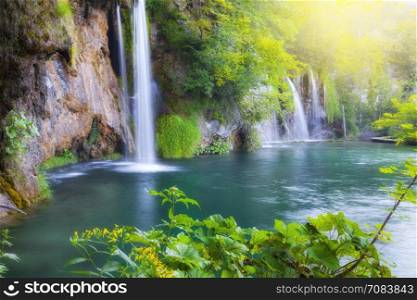 Beautiful green forest waterfall. Plitvice National Park, Croatia.