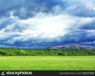 Beautiful green meadow and deep sky. Landscape design.. Beautiful landscape
