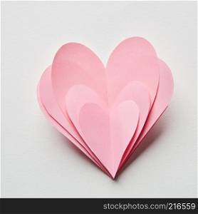 Beautiful hand made pink hearts on a white background. valentine day background.