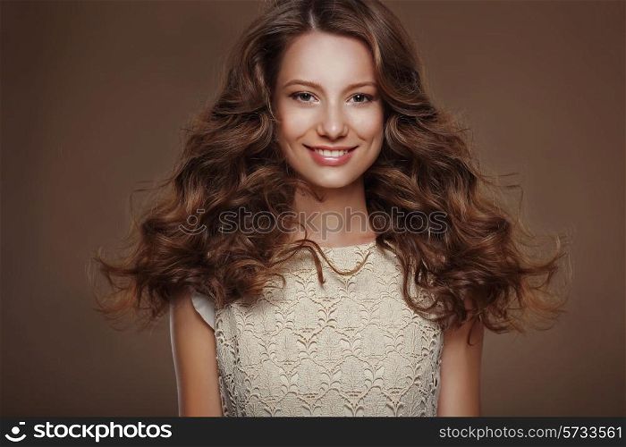Beautiful Happy Brunette with Long Curly Hairs