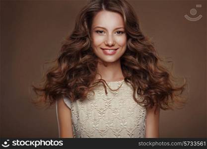 Beautiful Happy Brunette with Long Curly Hairs