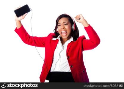 Beautiful happy business woman jamming singing listening to music on wireless mobile phone, on white.