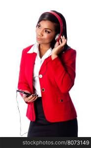 Beautiful happy business woman listening to podcast or music on wireless mobile phone, on white.