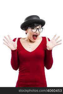 Beautiful happy girl wearing a hat and nerd glasses, isolated over white background