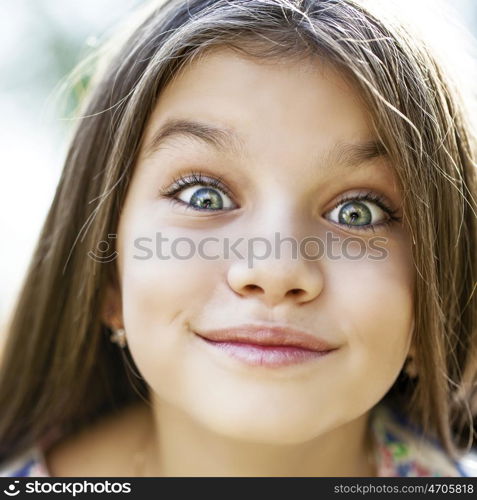 Beautiful Happy little girl outdoors