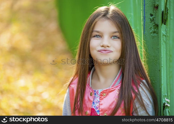 Beautiful Happy little girl outdoors