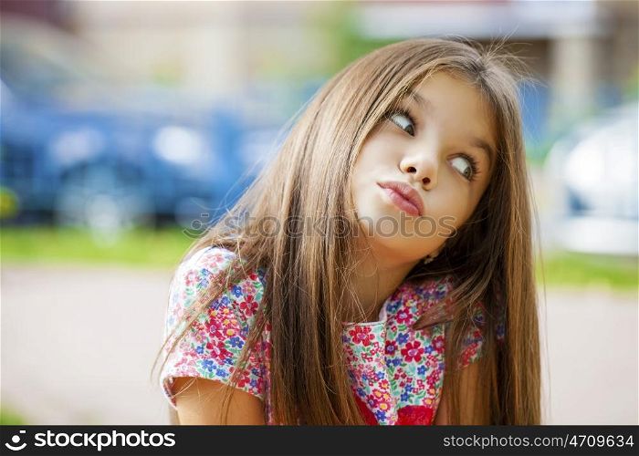 Beautiful Happy little girl outdoors