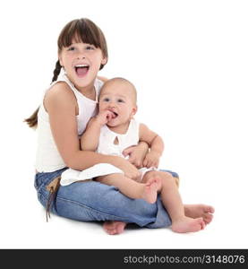 Beautiful Happy Sisters. Sitting together barefoot over white.