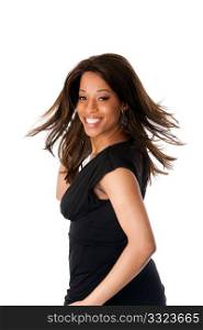 Beautiful happy smiling African American business woman in black dress swirling and twirling her long hair while turning head, isolated.