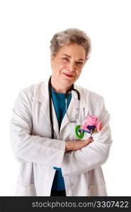 Beautiful happy smiling friendly experienced pediatrician nurse physician standing, isolated. Doctor for children with toy in pocket and stethoscope around neck and arms crossed.