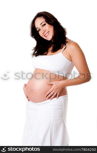 Beautiful happy smiling pregnant woman dressed in white holding her belly, isolated