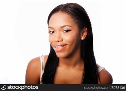 Beautiful happy smiling teenage girl with dental braces, on white.
