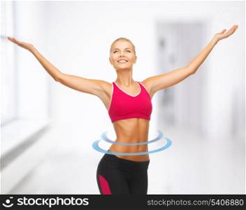 beautiful happy sportswoman with raised up hands