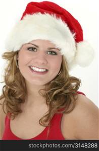 Beautiful happy teen girl in red tank top and santa hat. Great smile and teeth.